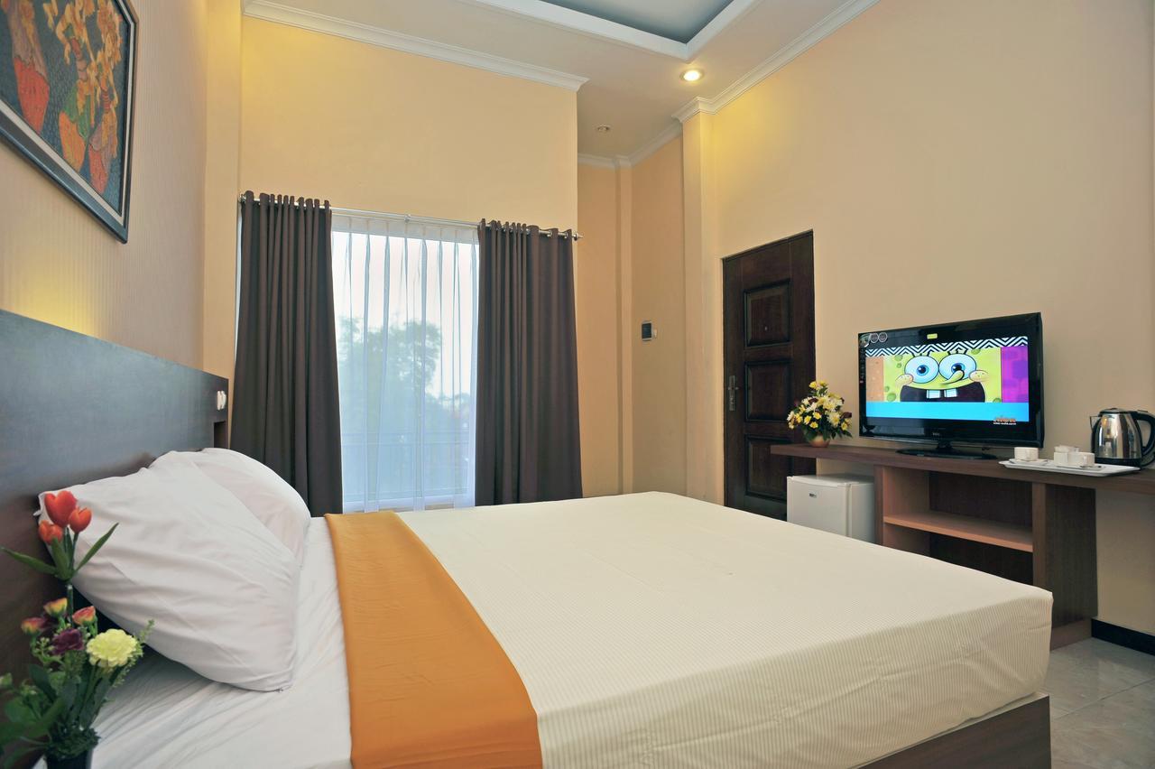 Hotel New Merdeka Pati Rom bilde